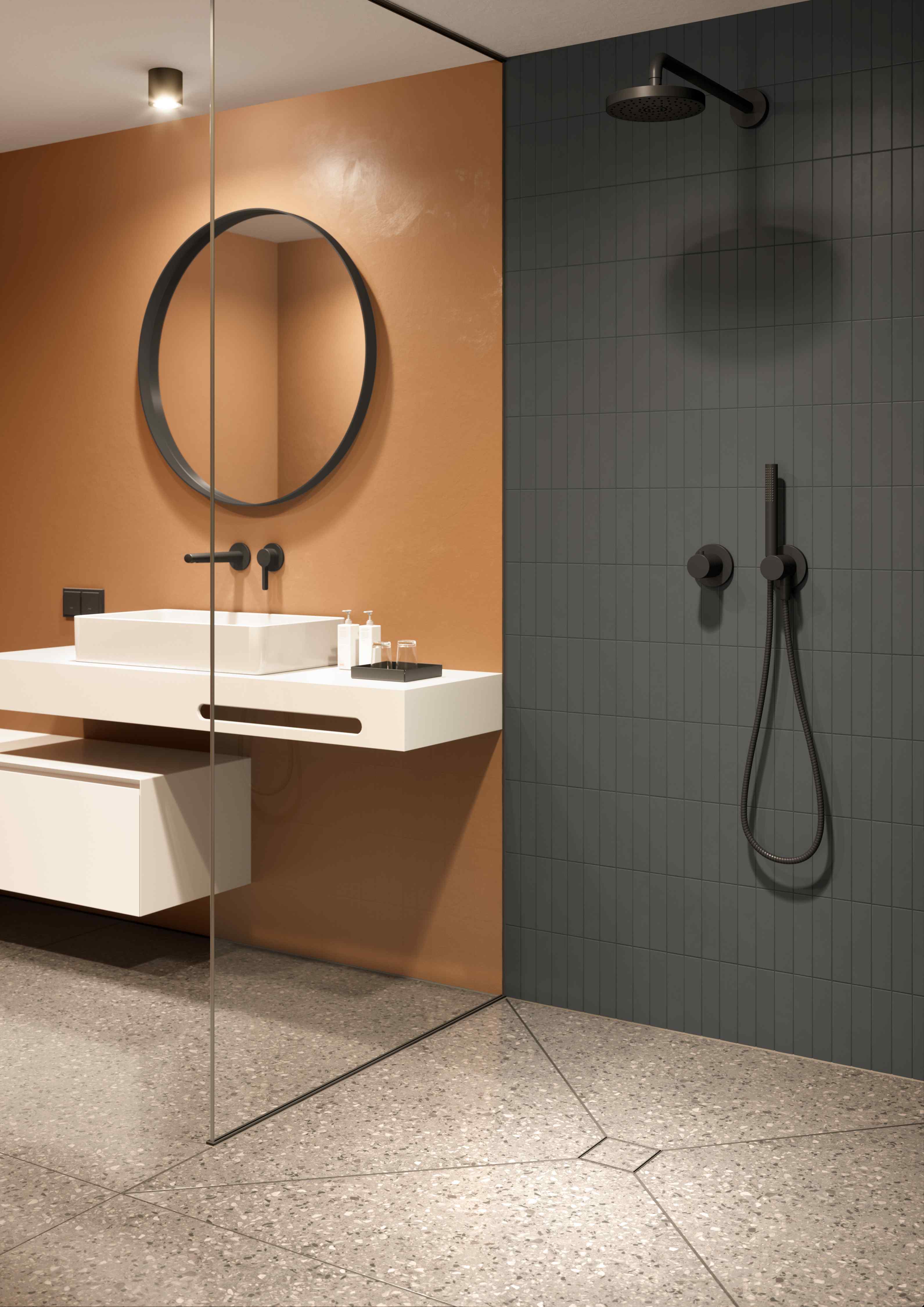 Eine schön gestaltete Duschfläche entsteht, indem man für den Aufsatz das gleiche Fliesen- oder Oberflächenmaterial wie im Bad verwendet.  Foto: Dallmer GmbH + Co. KG